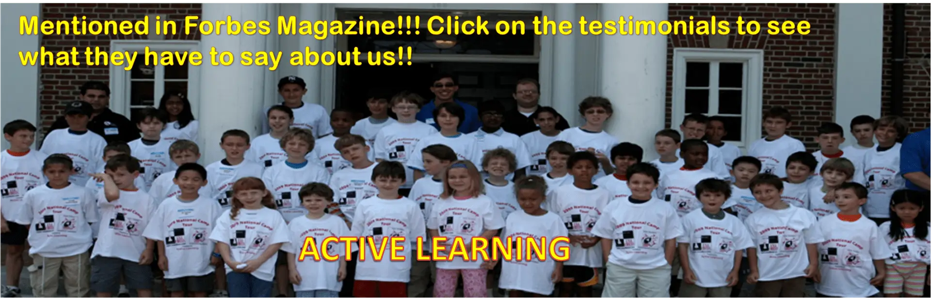 Children in matching camp t-shirts posing outdoors